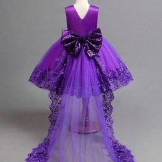 Young Girl Embroidery Sequin Bow Detail High Low Gown Dress. Birthday Girl Purple Princess Dress. Purple Dress For Kids, Dark Purple Gown, Purple Quince Dress, Purple Princess Dress, African Wedding Theme, Purple Ball Gown, Kids White Dress, Purple Quince