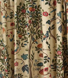 the curtains are decorated with birds and flowers