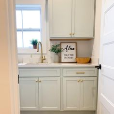 the kitchen is clean and ready to be used as a laundry room or mudroom