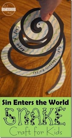 a kid is playing with some paper circles on the floor and it says, sin enters the world snake craft for kids