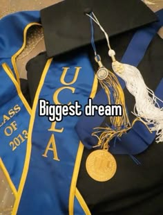 graduation caps and tassels with the words biggest dream on them