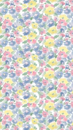 an abstract floral pattern with blue, yellow and pink flowers