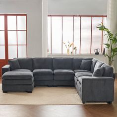 a large sectional couch in a living room