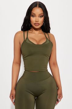 Available In Black And Olive. Active Top V Neck Sleeveless Elevate Mesh Panel Detail Racerback Medium Impact Pair With "Claudia Elevate Active Legging" Self 1 73% Polyester 27% Spandex Self 2 82% Nylon 18% Spandex Inner Mesh 82% Nylon 18% Spandex Imported | Carmen Elevate Active Top in Olive Green size Medium by Fashion Nova Active Top, Service Women, Active Leggings, Matching Dresses, Sport Fashion, Top Tee, Olive Green, Clothes For Sale