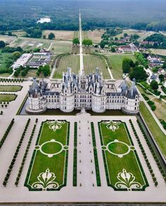 an aerial view of a large white castle