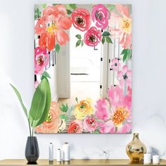 a mirror that has flowers on it