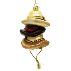 A Kurt Adler Nobel Gems Ornament


Howdy, partner! Saddle up and mosey on over to the frontier of holiday decorations with the Glass Stacked Western Hats Ornament by Kurt Adler's Noble Gems. It's a rootin'-tootin' masterpiece that'll add a touch of Wild West charm to your holiday festivities.

Now, picture this: Three mighty fine cowboy hats, stacked up like a tower of poker chips, all crafted from delicate glass. The top one's as white as a prairie ghost, complete with a shiny gold buckle that Cowboy Hat Christmas Ornaments, Cowboy Hat Ornament, Cowboy Christmas Ornaments, Southwest Christmas Ornaments, Southwestern Christmas Ornaments, Western Hats, Glitter Glass, All Craft, Holiday Festival