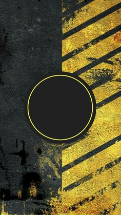 a black and yellow background with a circle on the bottom right corner, next to an orange stripe