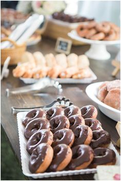 a table full of doughnuts and pastries on it's own screen