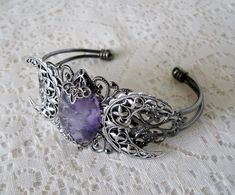 This beautiful silver plated cuff bracelet has a silver plated triple moon design and an amethyst setting with silver plated embellishments. Adjustable. Edgy Jewelry Rings, Wicca Jewelry, Goddess Bracelet, Triple Moon Goddess, Amethyst Set, Edgy Jewelry, Crystal Goddess, New Plymouth, Goddess Jewelry