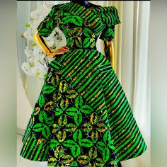 This Beautiful Handmade Ankara Dress Is Perfect For Any Fashion-Forward Woman. The Dress Comes In A Stunning Shade Of Green And Features A Hi-Low Hemline That Adds A Touch Of Elegance To Any Outfit. Its Comes S,M,L,Xl Size Design Makes It A Versatile Piece That Can Be Worn For Any Occasion. The Dress Is Perfect For Women Of All Sizes And Shapes, And Its Regular Size Type Ensures A Comfortable Fit. African Ladies Dress Design Fashion, Chitenje Dresses For Women, Chitenje Styles For Women, A Shape Dress Ankara, Classic Dresses For Women Classy, Ankara Designs For Ladies Dresses, African Dresses For Women Classy, Chitenje Styles, Latest Ankara Dress Designs