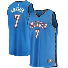 a blue basketball jersey with the number seven on it