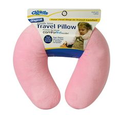 the travel pillow is pink in color