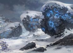 some rocks and snow with blue writing on them in the middle of a mountain range