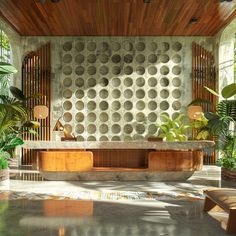 a large room with lots of potted plants on the wall and wooden benches in front of it