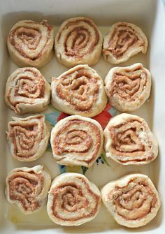 cinnamon rolls in a baking dish ready to be baked