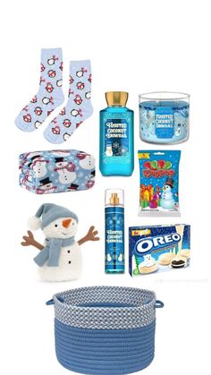 the contents of a baby's diaper bag including socks, toys and other items