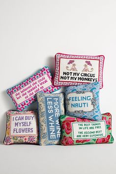 four different types of pillow cases sitting next to each other on a white surface with the words not my circus written on them