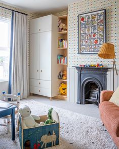 a living room filled with furniture and a fire place