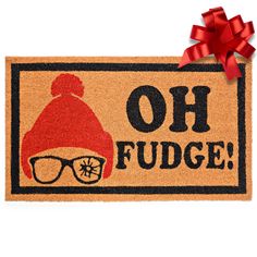 a door mat that says oh fudge with sunglasses and a santa hat on it