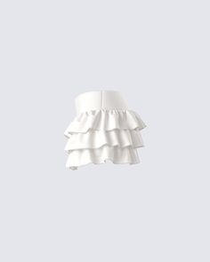 FYI…this ivory ruffle mini skirt is bound to make everyone fall for you 😚 Made from stretch jersey fabric and featuring a pull-on style and tiered ruffles for a fun and playful everyday piece 🤍 Fitted White Tiered Skort, White Stretch Tiered Mini Skirt, White Flowy Tiered Tennis Skirt, White Ruffled Mini Skirt For Party, Stretch Ruffled Skort For Parties, White Ruffled Skirt For Party, White Ruffled Party Skirt, Stretch Skort With Ruffles For Party, White Ruffled Mini Bottoms