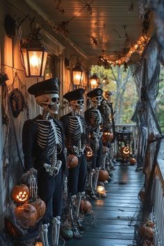 halloween decorations on the porch with skeletons and pumpkins