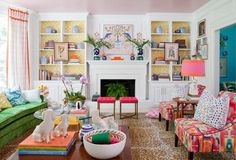 a living room filled with lots of colorful furniture