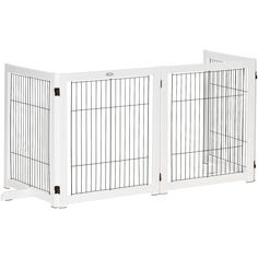 two white dog gates with doors open