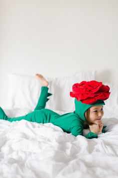 PREORDER: This item will ship August 15th.   This lovely rose costume is the perfect addition to any dress-up box.  It comes with a soft, eco-friendly cotton top and bottom and a hat that snaps under the chin. Buy it on its own or with our other flower costumes for a precious bouquet! 95% cotton, 5% spandex. Made in the USA. Flower Costumes, Costume Fleur, Rose Costume, Pajama Costume, Flower Costume, Dress Up Boxes, Costume For Kids, Cotton Pajamas, Love Band