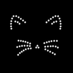 an image of a face made out of small white dots on a black background that looks like a cat