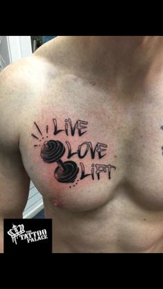 a man's chest with the words live love lift written in black ink on it