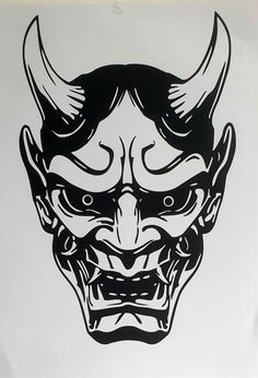 a black and white drawing of a demon with horns on it's head is shown