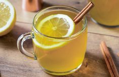 a glass mug filled with lemonade and cinnamon