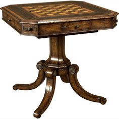 a wooden table with a chess board on it's top and two drawers at the bottom