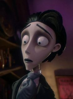 an animated character with black hair wearing a suit and tie, looking at the camera