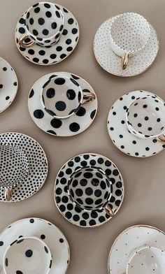 black and white plates with polka dots on them