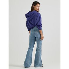 "(Previously known as Vintage Modern High Rise Seamed Flare Jean) With enough extra flare-legged fabric to dress an entire decade, our High Rise Flare Jean isn't just a '70s throwback; it's the real deal. Rekindled from patterns in our archives, this high rise creates a beautifully trimmed waistline, followed by a snug-yet-comfortable fit in the seat and thighs and a 31"" inseam length. With a wash inspired by a pair of archived bell bottoms, these look like they walked right outta Woodstock." 6 Retro Flares With Flared Hem, Retro Cotton Flares For Fall, Retro Spring Flare Pants, Retro Flares For Fall, Retro Fall Flares, Retro Spring Flares With Flared Hem, Spring Retro Flares, Retro Spring Flares, Retro Full-length Fall Flares