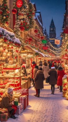 people are walking through an outdoor christmas market