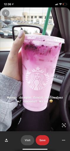 someone holding up a pink drink in their hand with the caption starbucks dragon fruit freezer by coconut milk