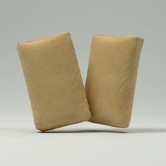 two pieces of cloth sitting on top of each other