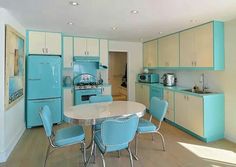 a kitchen with blue and white appliances in it