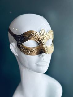 Crafted with meticulous artistry, this golden mask captures the essence of Venetian glamour, perfect for masquerade balls, themed galas, or any occasion where you want to make a dramatic entrance.


Age Group/Gender - Adult/Women

Size/Type - One size fits all adults

Mask Color - Gold

Mask Material - Polyresin

Accent Material - Paint Luxury Gold Mask For Masquerade, Golden Mask, Gold Masquerade Mask, Gold Face Mask, Dramatic Entrance, Gold Mask, Venetian Masks, Venetian Mask, Rich Family