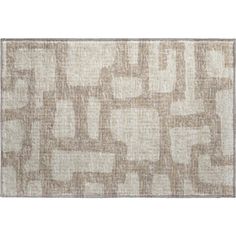 an area rug with squares and rectangles on the front, in neutral colors