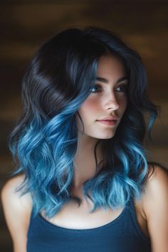 Blue Ombre hairstyles offer a #Bold, #vibrant look with #stunning gradients of #blue shades. #Ombrehair Purple Into Blue Ombre Hair, Ombré Hair Blue, Hair Color Ideas Multicolor, Blue Hair Gradient, Blue Brunette Hair, Brunette And Blue Hair, Blue Hair Dark Roots, Dark Blue Hair Ombre, Brown To Blue Ombre Hair