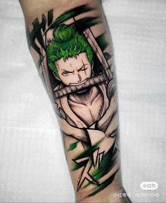 a man's leg with a tattoo on it that has a joker face and green hair