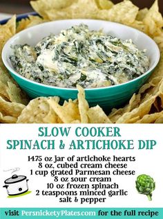 a bowl of spinach and artichoke dip with tortilla chips on the side