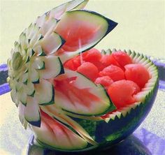 a watermelon and kiwi fruit bowl on a plate