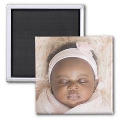 a baby girl sleeping with her eyes closed refrigerator magnets