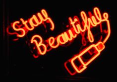 a neon sign that says, stay beautiful