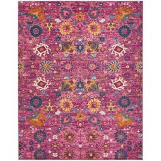 a pink rug with colorful flowers on it